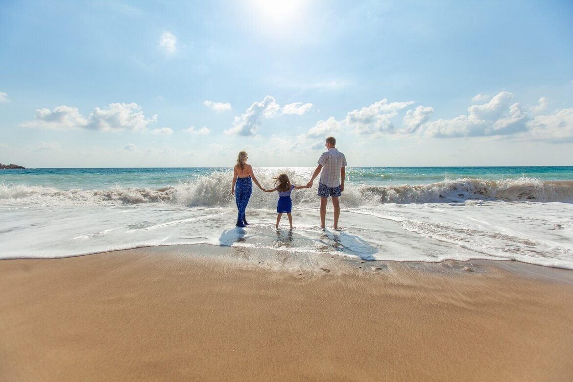 best family friendly destinations, family on beach